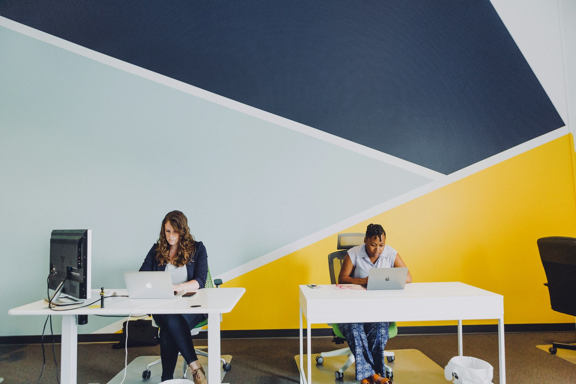 Branding your start up - Thom Baker Branding

Two business women work in office with dynamic geometric shapes on the wall 